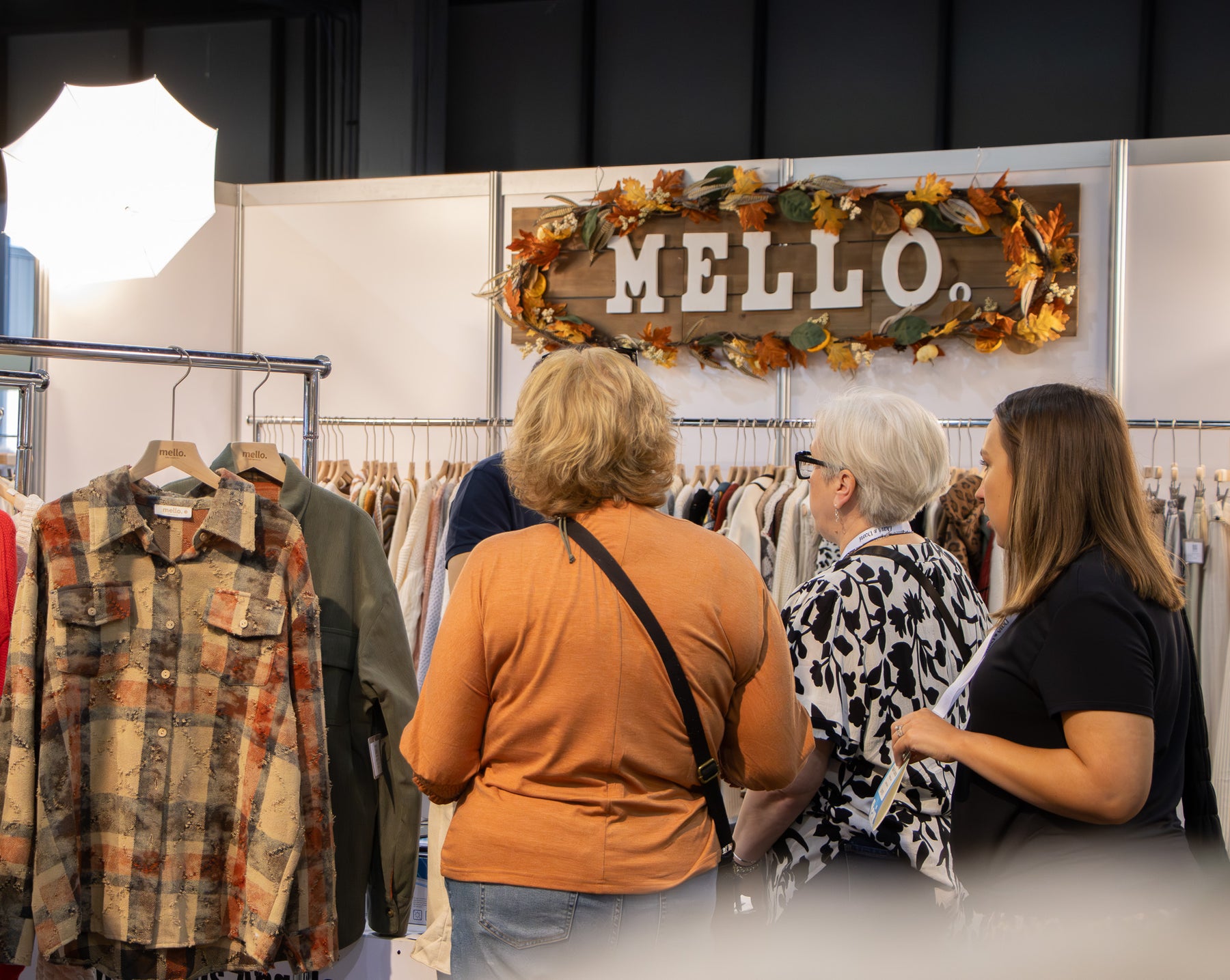 Retail buyers viewing Fall apparel collections at the FLAIR market